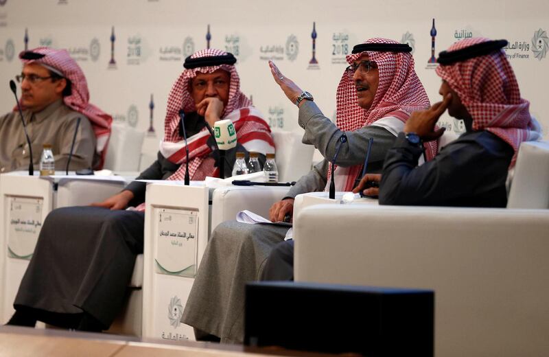 Mohammed Al-Jadaan, Saudi Minister of Finance, gestures during a news conference announcing the 2018 state budget, in Riyadh, Saudi Arabia December 19, 2017. REUTERS/Faisal Al Nasser