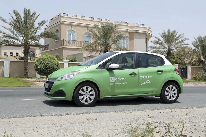 
DUBAI , UNITED ARAB EMIRATES , AUG 20  – 2017 :- Car from UDrive short term rental car services parked near the Sheikh Zayed Road in Dubai. ( Pawan Singh / The National ) Story by Adam Workman
