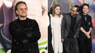Bono, and Vivienne and Knox Jolie-Pitt, with their brother, Maddox. AFP, Getty Images