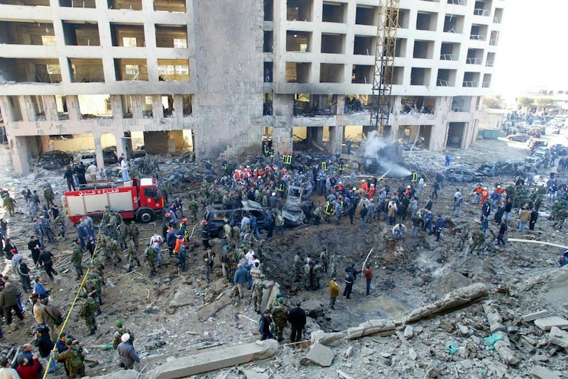 A general view shows the site of an explosion in Beirut 14 February 2005. Lebanon's former prime minister Rafiq Hariri was killed in the huge explosion in central Beirut, hospital sources said. The blast set ablaze cars and devastated buildings in a seafront area of the Lebanese capital on Monday, leaving smouldering bodies in the streets.      AFP PHOTO/ANWAR AMRO / AFP PHOTO / ANWAR AMRO