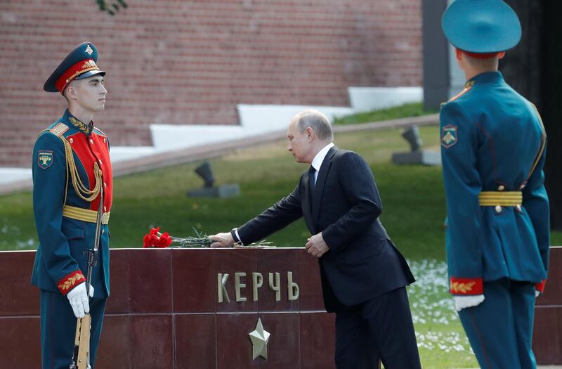 Russian president Vladimir Putin lays flowers during a ceremony in Moscow marking the anniversary of the Nazi German invasion in 1941. Sergei Karpukhin / Reuters