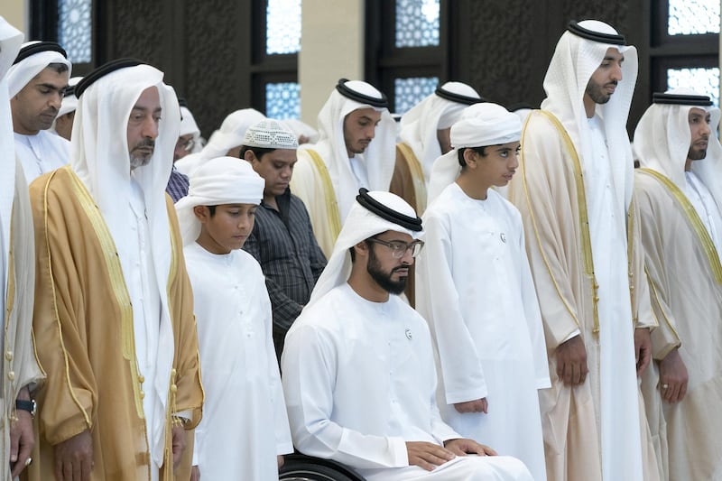 ABU DHABI, UNITED ARAB EMIRATES - June 04, 2019: 
HH Sheikh Nahyan bin Hamdan bin Mohamed Al Nahyan, 
HH Sheikh Zayed bin Tahnoon bin Zayed, HH Sheikh Zayed bin Hamdan bin Zayed Al Nahyan, HH Sheikh Rashid bin Hamdan bin Zayed Al Nahyan and HH Sheikh Shakboot bin Nahyan bin Mubarak Al Nahyan, UAE Ambassador to Saudi Arabia, attend Eid Al Fitr prayers at the Sheikh Sultan bin Zayed the First mosque in Al Bateen. 

( Rashed Al Mansoori / Ministry of Presidential Affairs )
---
