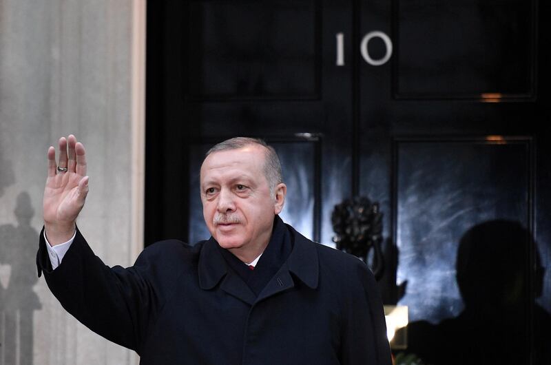 Turkey's President Tayyip Erdogan waves outside 10 Downing Street ahead of the NATO summit in London, Britain December 3, 2019. Daniel Leal-Olivas/Pool via REUTERS