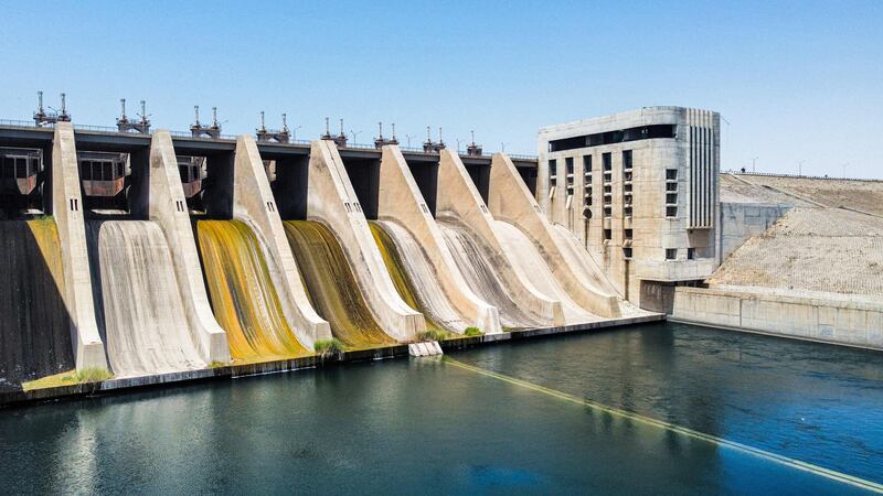 An aerial view of the closed sluice gates at the 1973 Tabqa Dam along the Euphrates river in Raqqa province in eastern Syria.  AFP