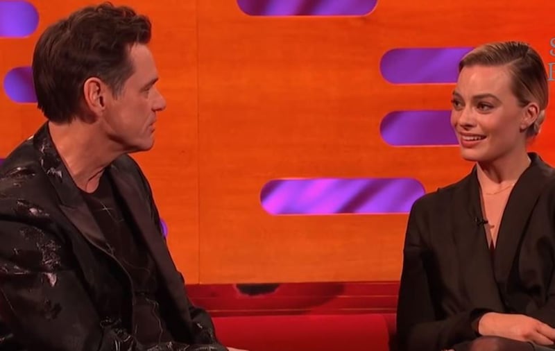 Margot Robbie grimaced through Jim Carrey's awkward comments. YouTube