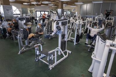 Mask-wearing gymgoers exercise in San Francisco. Bloomberg / Getty Images