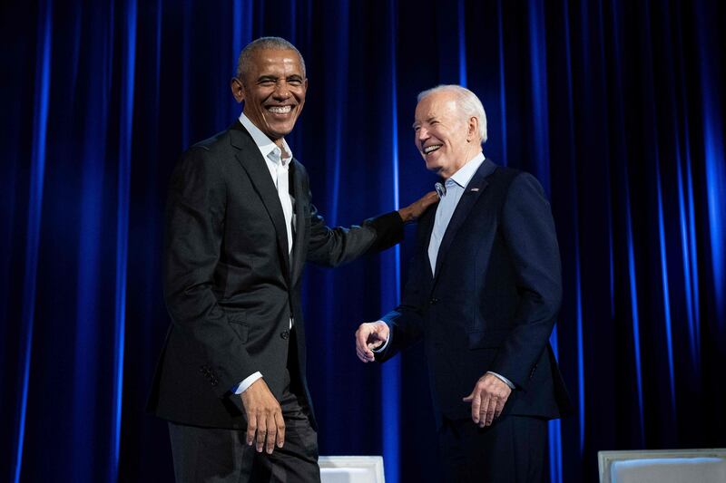 Former US president Barack Obama, left, and US President Joe Biden arrive for a campaign fundraising event at Radio City Music Hall in New York City. AFP