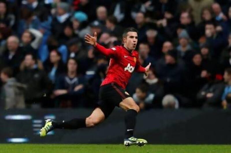 Robin Van Persie celebrates scoring for Manchester United - his 22 goals so far this season have played a key role in effectively securing the Premier League title.