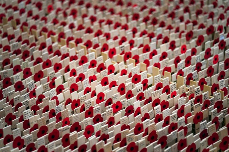 Rows of poppies are laid out in the Field of Remembrance outside Westminster Abbey in central London. PA