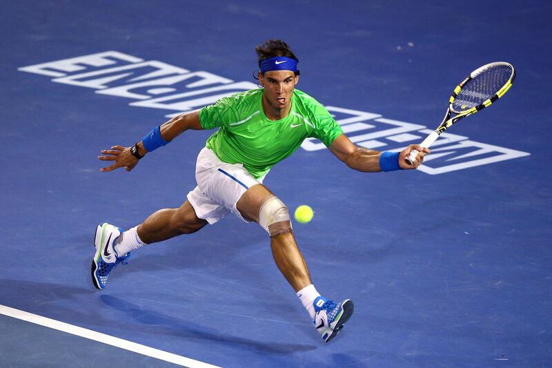 MELBOURNE, AUSTRALIA - JANUARY 29:  Rafael Nadal of Spain plays a forehand in his men's final match against Novak Djokovic of Serbia during day fourteen of the 2012 Australian Open at Melbourne Park on January 29, 2012 in Melbourne, Australia.  (Photo by Clive Brunskill/Getty Images)