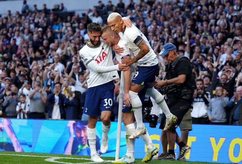 Tottenham's Eric Dier celebrates with team-mates after scoring their second goal. PA