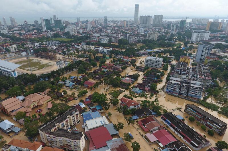 An aerial view shows the flooded George Town city in Penang, Malaysia. AP Photo