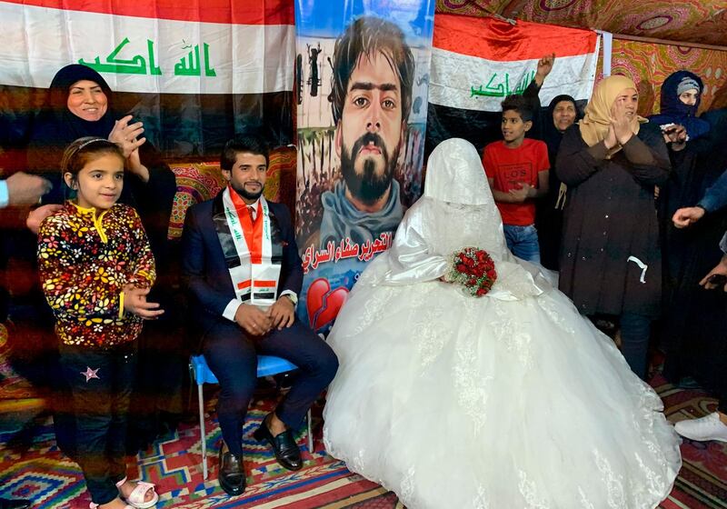 Saif Ali and his bride celebrate their wedding inside a protesters' tent. AP