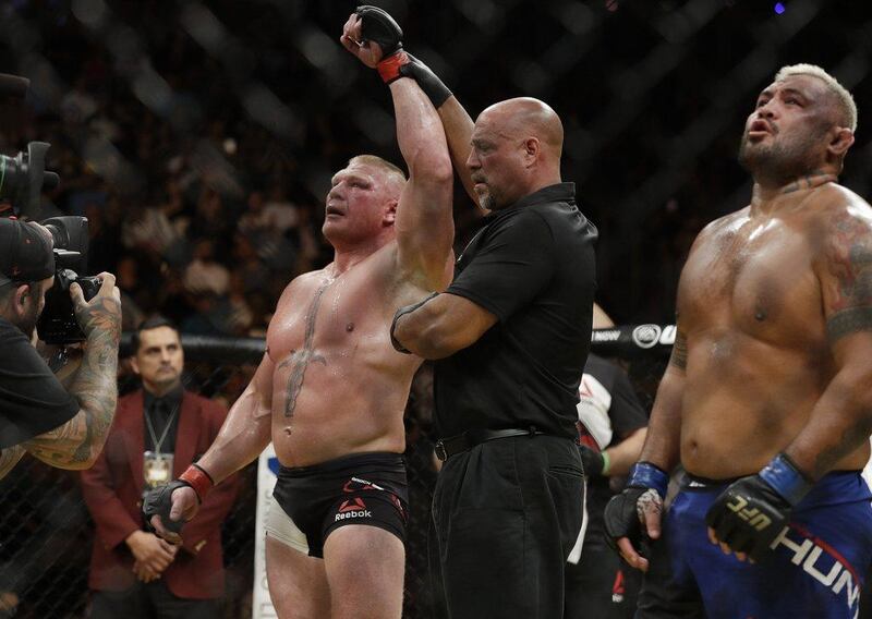 Brock Lesnar celebrates after defeating Mark Hunt in a heavyweight bout at UFC 200, Saturday, July 9, 2016, in Las Vegas. John Locher / AP Photo