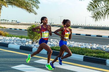 Ababel Yeshaneh, and Brigid Kosgei race for the finish line in the 2020 RAK Half Marathon in February. Supplied photo
