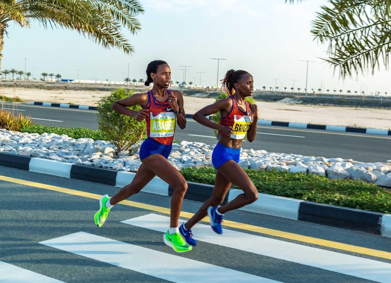 Current Half Marathon World Record Holder, Ababel Yeshaneh, and Brigid Kosgei, current Marathon World Record holder, race for the finish line in the 2020 race in the RAK Half Marathon in February 21, 2020. Supplied photo