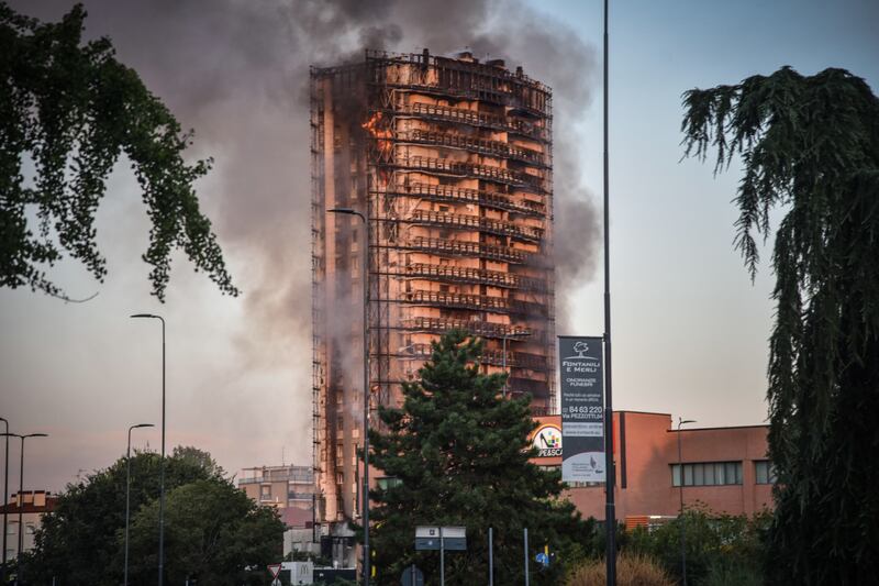Heavy smoke from an apartment block in Via Antonini, in the southern suburbs of Milan, Italy. EPA