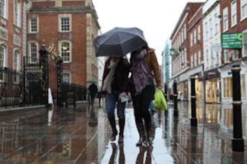 Shoppers brave the English winter weather in Worcester, where shopkeepers and residents are divided on the town twinning plan.