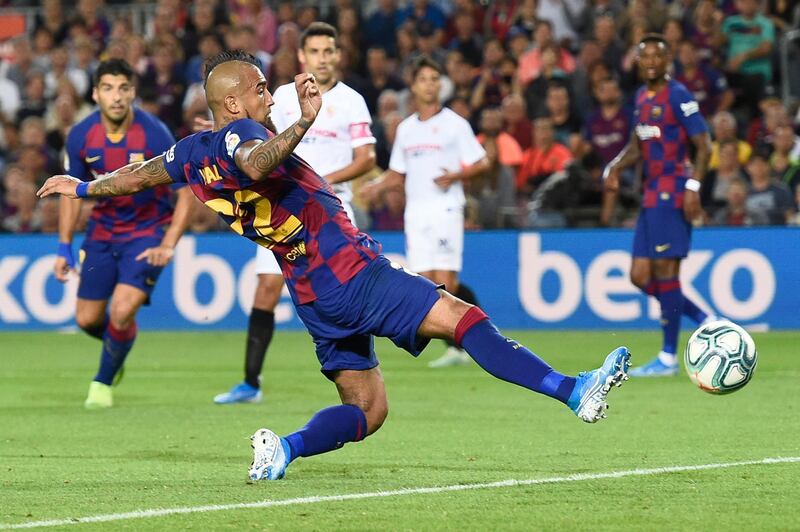 Barcelona's Chilean midfielder Arturo Vidal scores a goal. AFP