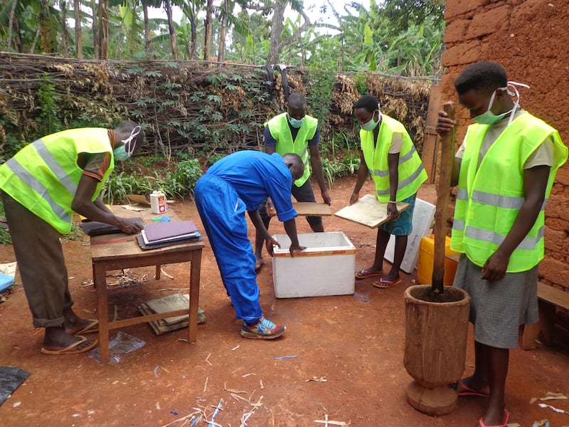 The team spends hours separating paper, banana and rice waste before its converted to pulp. Photo: Jolis Nduwimana