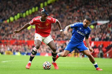 MANCHESTER, ENGLAND - OCTOBER 02: Paul Pogba of Manchester United battles for possession with Allan of Everton during the Premier League match between Manchester United and Everton at Old Trafford on October 02, 2021 in Manchester, England. (Photo by Michael Regan / Getty Images)