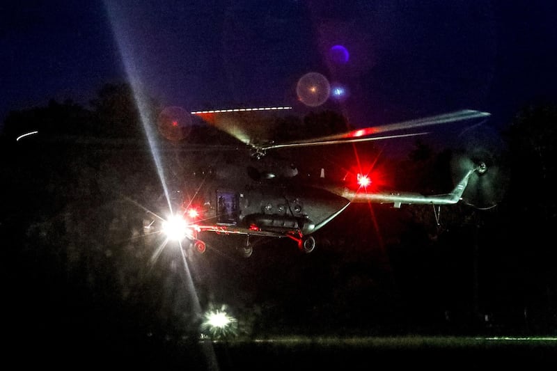 A helicopter lands at a military airport in Chiang Rai. AFP