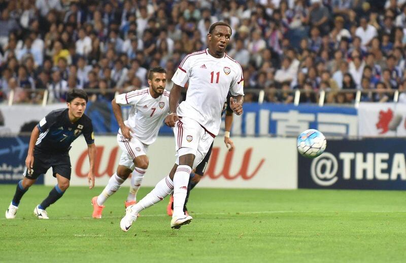 Ahmed Khalil scores a Paneka penalty kick against Japan at the Saitama Stadium in Japan to give UAE a 2-1 lead. Kazuhiro Nogi / AFP