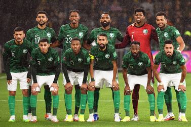 Players of Saudi Arabia line up for the FIFA World Cup 2022 qualifying soccer match between Australia and Saudi Arabia in Sydney, Australia, 11 November 2021.  Back from L: Abdulelah Alamri, Mohamed Kanno, Feras Al-Birakan, goalkeeper Mohammed Al Yami, and Ali Al Bulayhi.  Front from L: Abdulelah Al Malki, Sultan Al-Ghannam, Nasser Al Dawsari, Salman Al Faraj, Fahad Al Muwallad, and Salem Al Dawsari.   EPA / DEAN LEWINS  AUSTRALIA AND NEW ZEALAND OUT