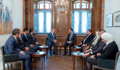 Syrian President Bashar Al Assad receiving a delegation of Jordanian members of parliament. Twitter