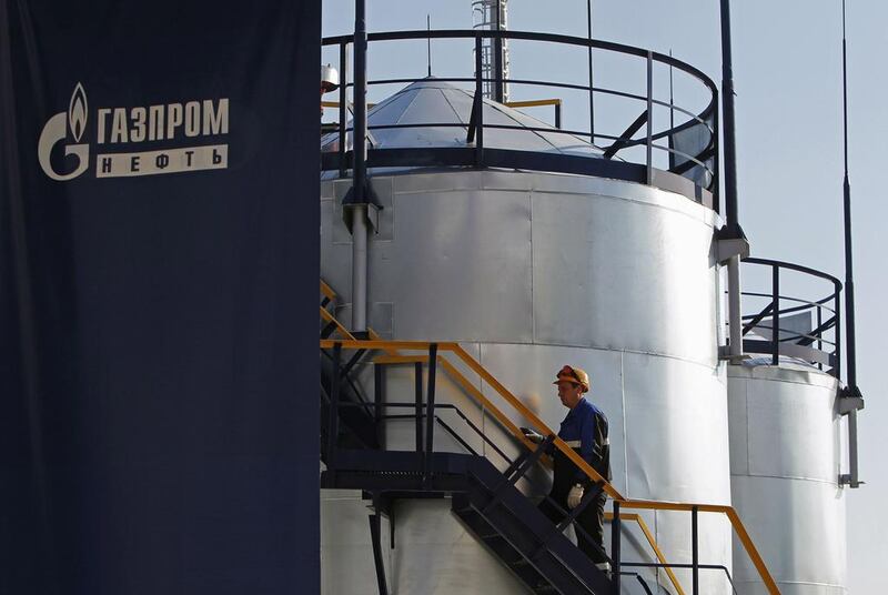 2nd: Gazprom - 8.3 million boepd. An employee walks up the stairs at the Gazprom Neft oil refinery in Moscow. Reuters