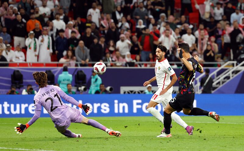 Jordan's Yazan Al Naimat scores their first goal. Reuters