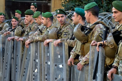 Lebanese army soldiers stand guard during a protest by retired members of Lebanese security outside the government palace in downtown Beirut, Lebanon, December 15, 2023. EPA