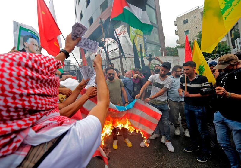 Protesters during an anti-US demonstration near the American embassy in Awkar, north-east of Lebanon's capital Beirut. AFP