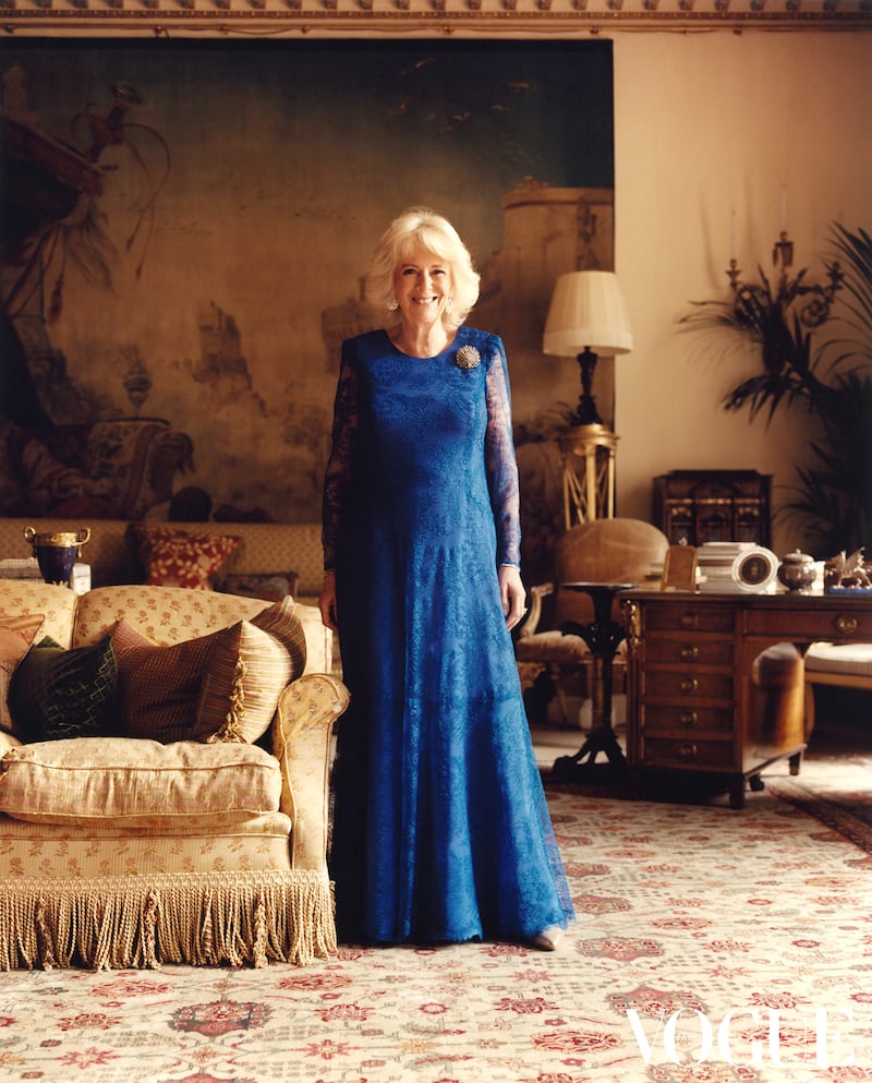 The queen consort, wearing a blue Bruce Oldfield gown, in photo taken for British Vogue at Clarence House for the magazine's July issue. AP 