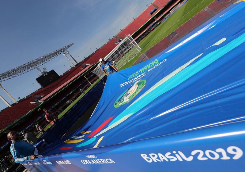 Workers prepare a decoration at Morumbi Stadium in Sao Paulo, Brazil ahead of the 2019 Copa America. The tournament will be held in Brazil from June 14-July 7. EPA