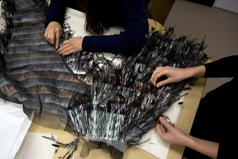 The pieces embroidered by the Montex ateliers, and those covered with feathers and lurex fringes by the Lemarié ateliers, are sent back to the Chanel ateliers to be assembled. (Courtesy: Chanel)