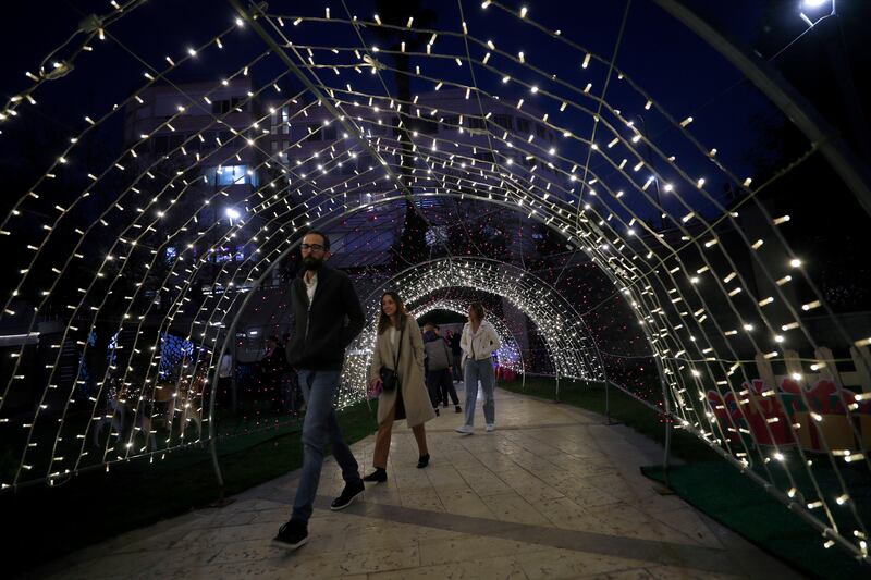 Palestinians visit the Christmas market in the West Bank city of Ramallah, marking the beginning of festive celebrations in the city. All photos: EPA