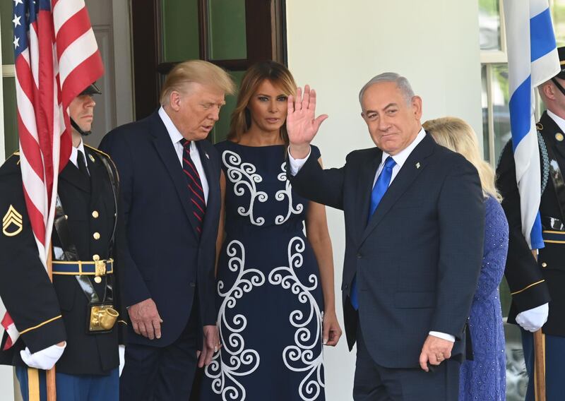US President Donald Trump and First Lady Melania Trump welcome the arrival of Prime Minister of Israel Benjamin Netanyahu and his wife Sara on the North Lawn of the White House in Washington DC. AFP