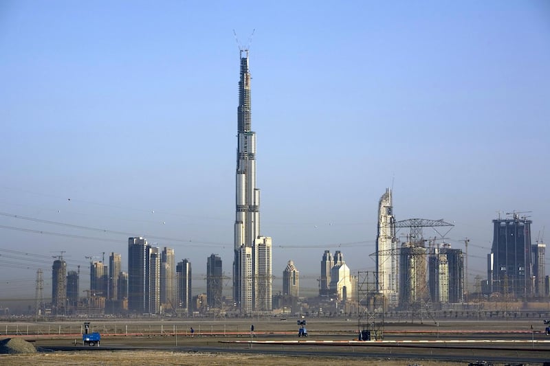 DUBAI, UNITED ARAB EMIRATES (ARE) - 2008:  The Burj Dubai, the world's tallest structure, rises from the desert in this 2008 Dubai, United Arab Emirates, cityscape photo. (Photo by George Rose/Getty Images)