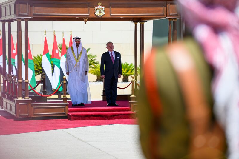 President Sheikh Mohamed stands with King Abdullah