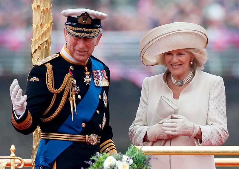 Prince Charles and the Duchess of Cornwall take part in a Thames river pageant, part of the diamond jubilee celebrations in 2012