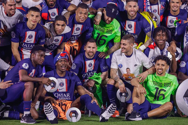 Lionel Messi and his Paris Saint-Germain teammates celebrate with the Ligue 1 trophy after the match against Clermont on June 3, 2023.  EPA