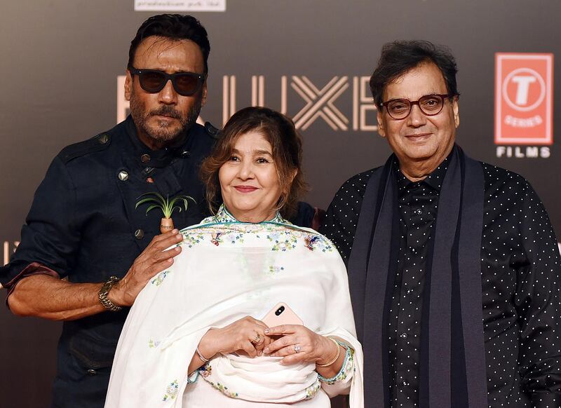 Bollywood actor Jackie Shroff, left, film director Subhash Ghai, right, with his wife Elsa George known as Mukta, centre, attend the premiere of Hindi film 'Bharat' in Mumbai on June 4, 2019. AFP