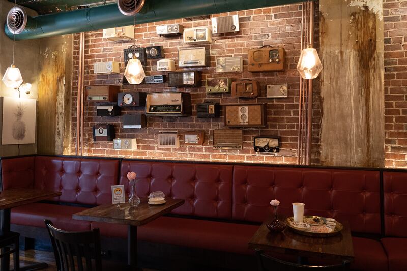 The wall of antique radios are a popular topic of conversation among Pistachio’s customers. Sophie Tremblay / The National