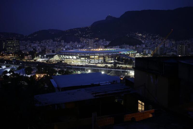 Maracana stadium is seen on May 21, 2014 from Mangueira slum before the last Brazilian league football match between Fluminense and Sao Paulo before the 2014 World Cup starts on June 12. Hassan Ammar / AP Maracana