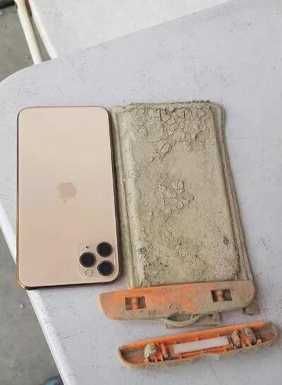 A photo taken from Facebook of the iPhone after it was recovered from Sun Moon Lake in Taiwan. Courtesy Bao Fei 1 Commune (爆廢1公社) Facebook group