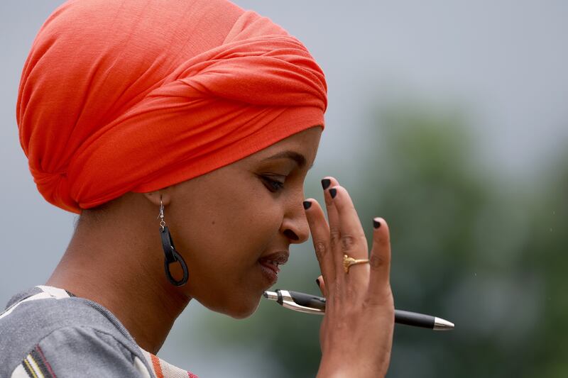 Ms Omar speaks in June outside the US Capitol building about global and domestic food crises. Getty / AFP

