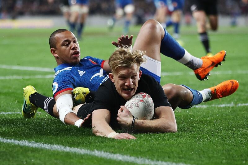 AUCKLAND, NEW ZEALAND - JUNE 09:  Damian McKenzie of the All Blacks scores a try during the International Test match between the New Zealand All Blacks and France at Eden Park on June 9, 2018 in Auckland, New Zealand.  (Photo by Phil Walter/Getty Images)