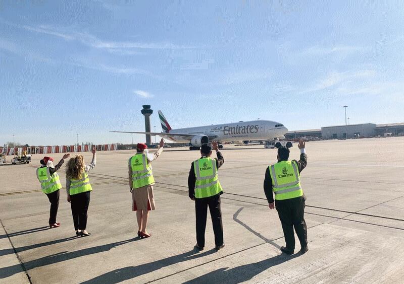 The outstation airport team at London Stansted sent of the last Emirates passenger flight before the UAE's temporary flight suspension took effect. Courtesy Emirates 