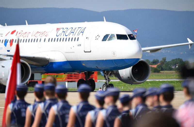 Croatian national football team lands on the tarmac of the international airport in Zagreb. Attila Kisbenedek / AFP